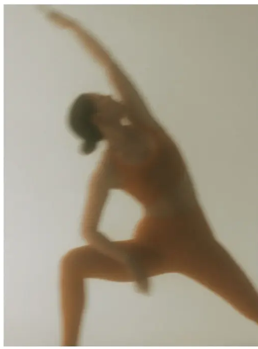 Soft-focus photograph of a dancer mid-movement
